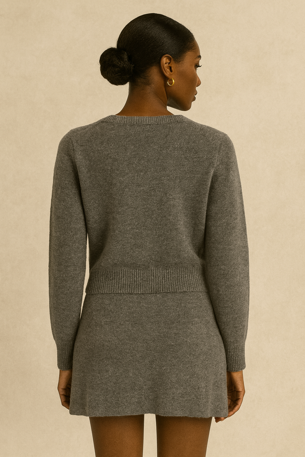 Model showing back of soft knit set in gray
