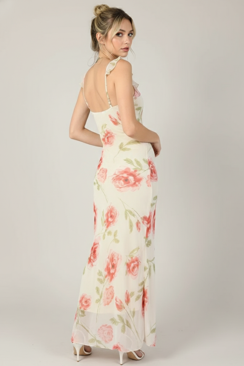 Woman wearing a floral dress with a plain background