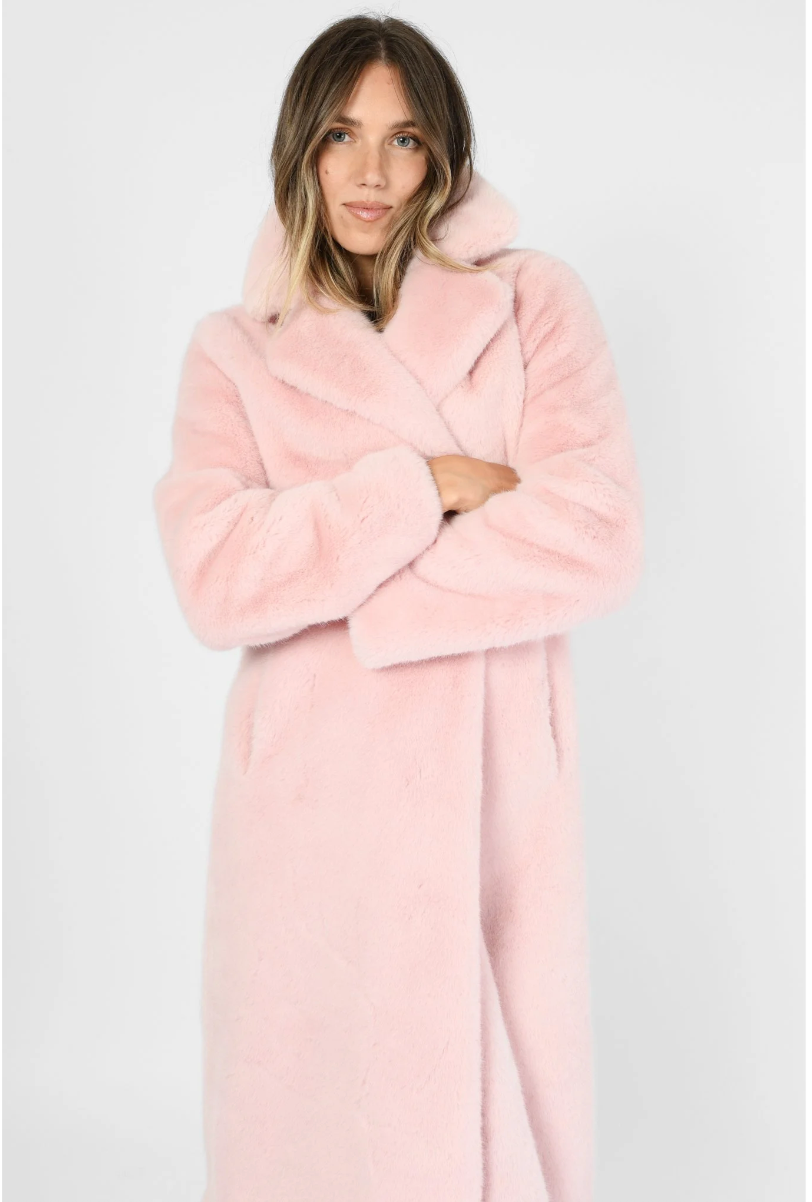 Model wearing pink mink fur coat