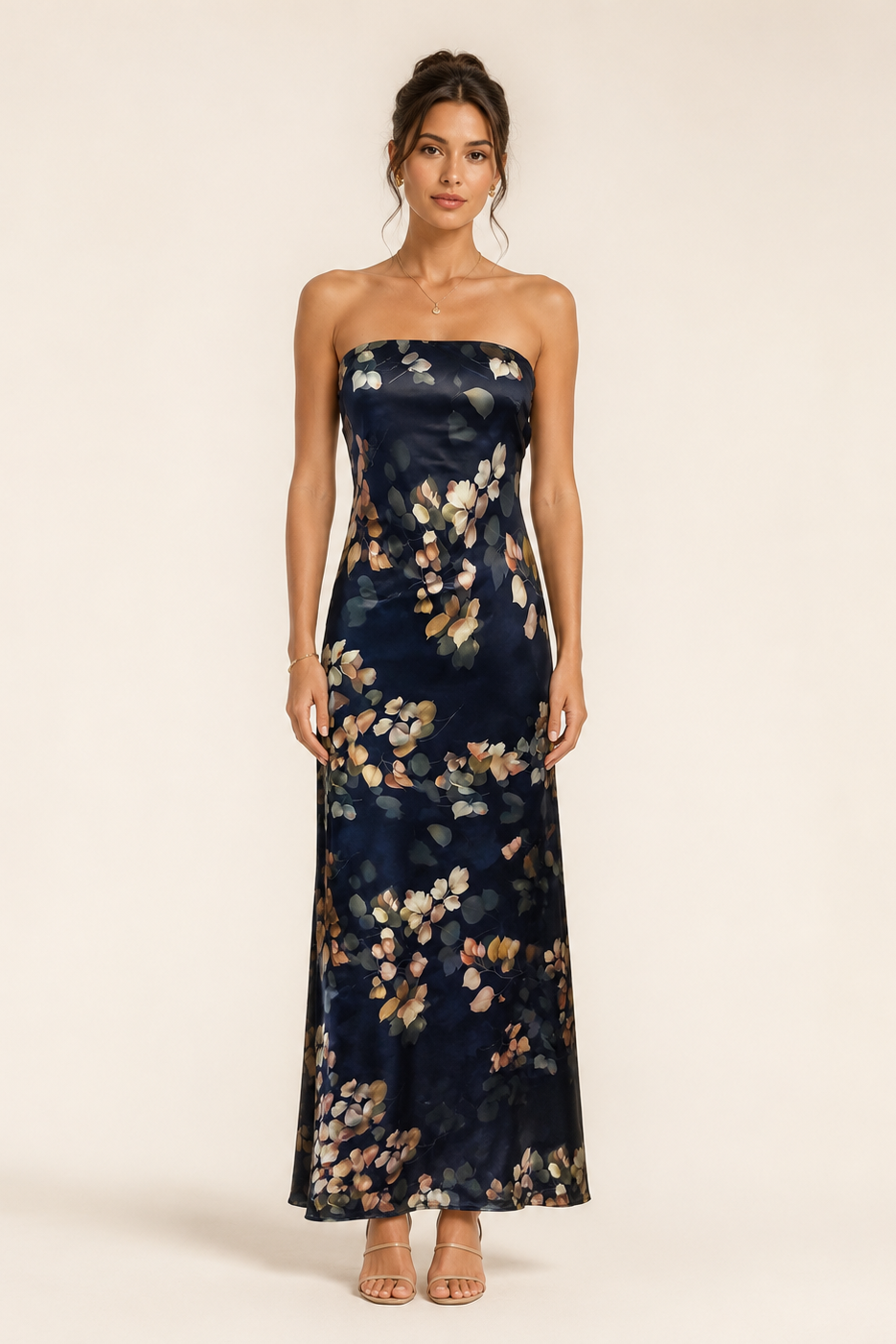 Woman wearing a strapless floral dress on a plain background