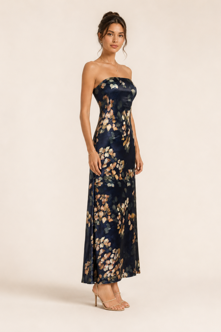 Woman wearing a strapless floral dress on a beige background