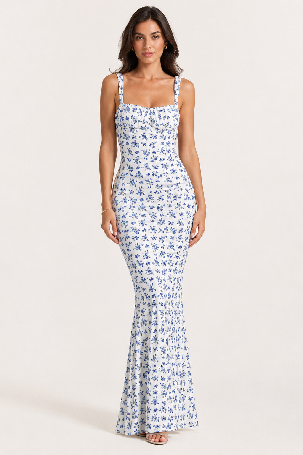 Woman wearing a floral dress on a white background
