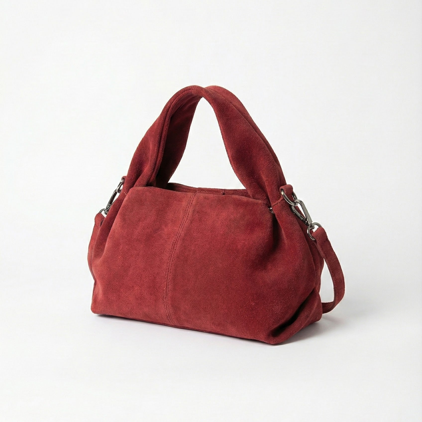 Red handbag on a white background