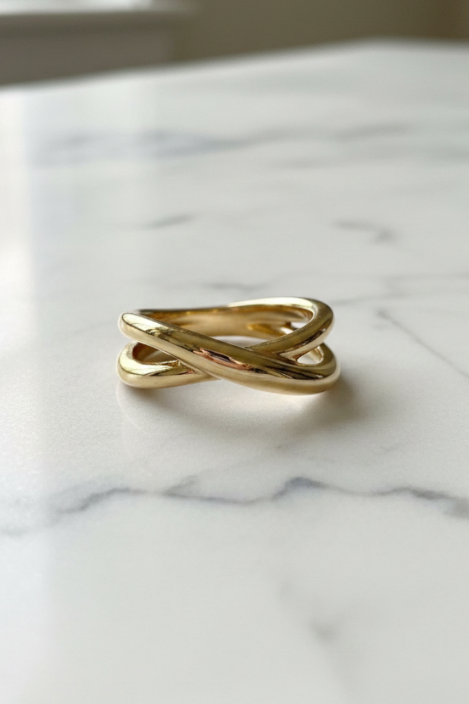 Gold ring on a marble surface