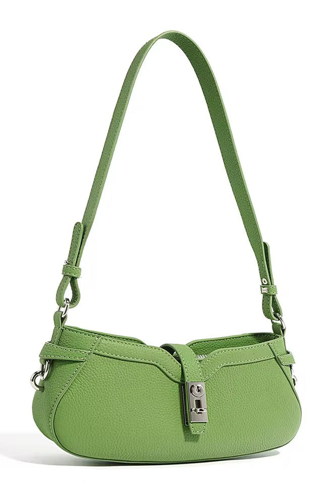 Green handbag on a white background